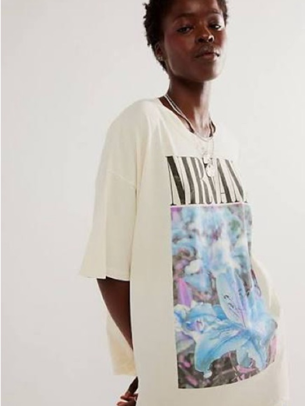 Daydreamer Oversized Nirvana Graphic Tee in Cream with Pastel Blue Floral Print